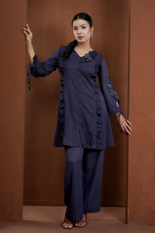 Monochromatic two piece set with frill panels — 1
