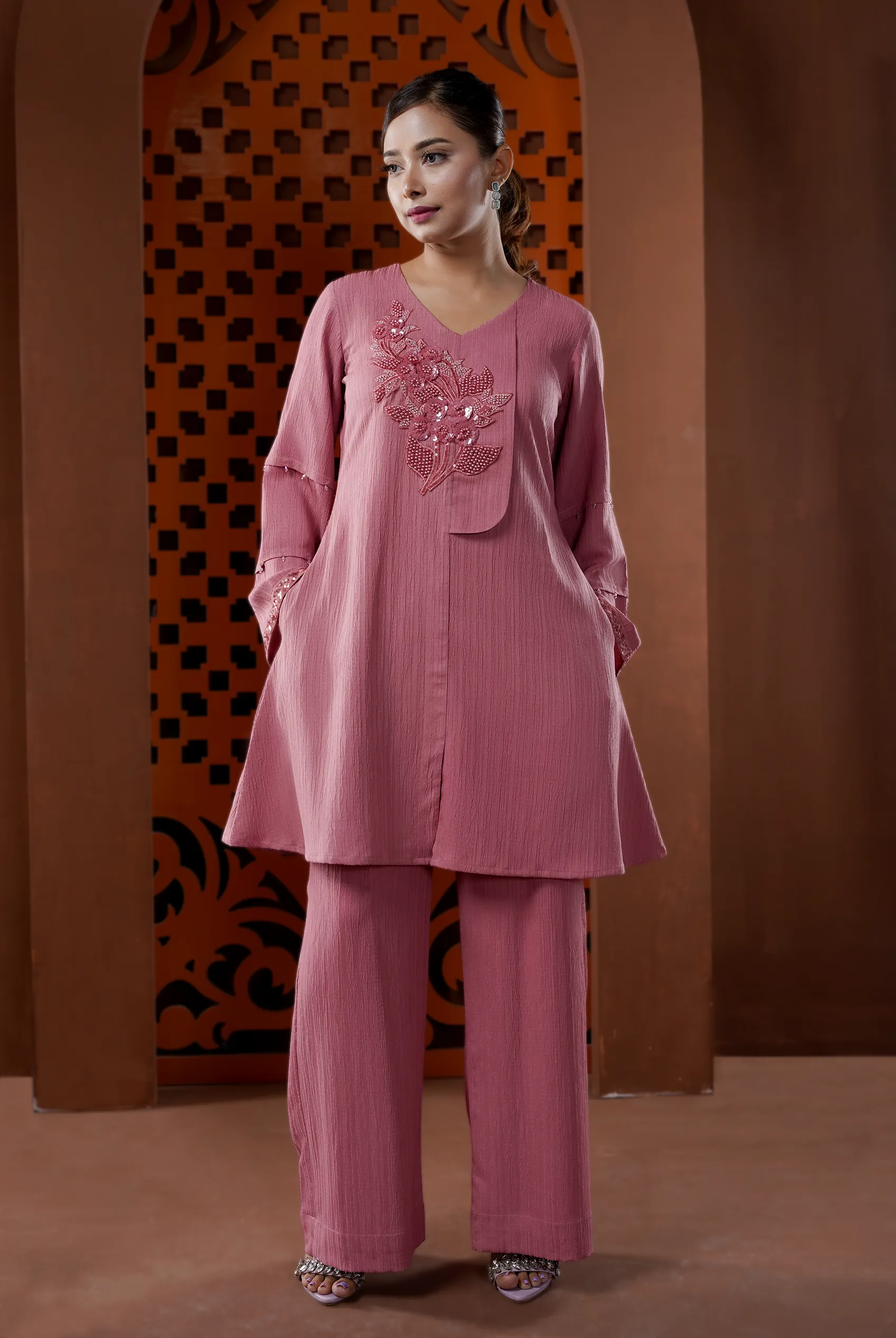 Monochromatic two piece assymetric set with lace appliques